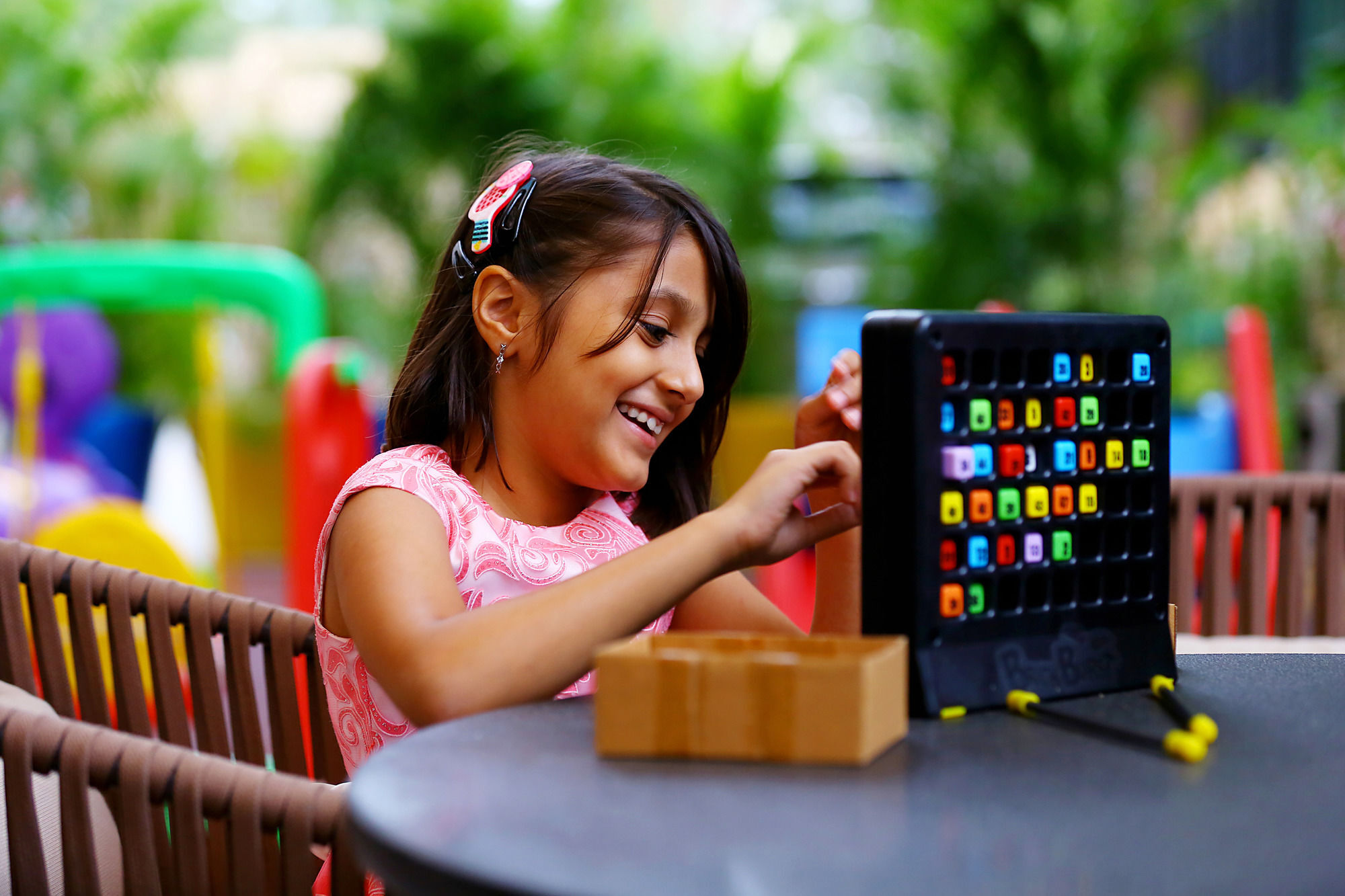 Grand Mercure Mysore - An Accor Brand Exterior photo A child playing with a tablet
